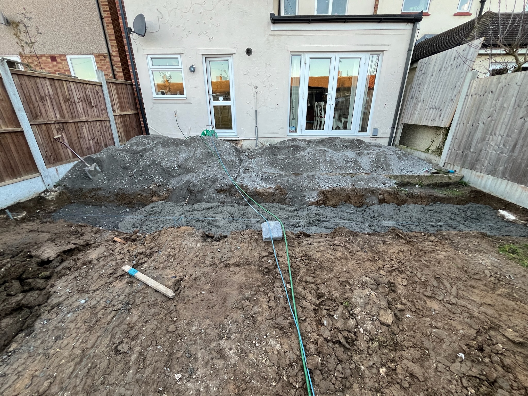 Lava Beige Porcelain Patio with Turf and Play Area before photo 2