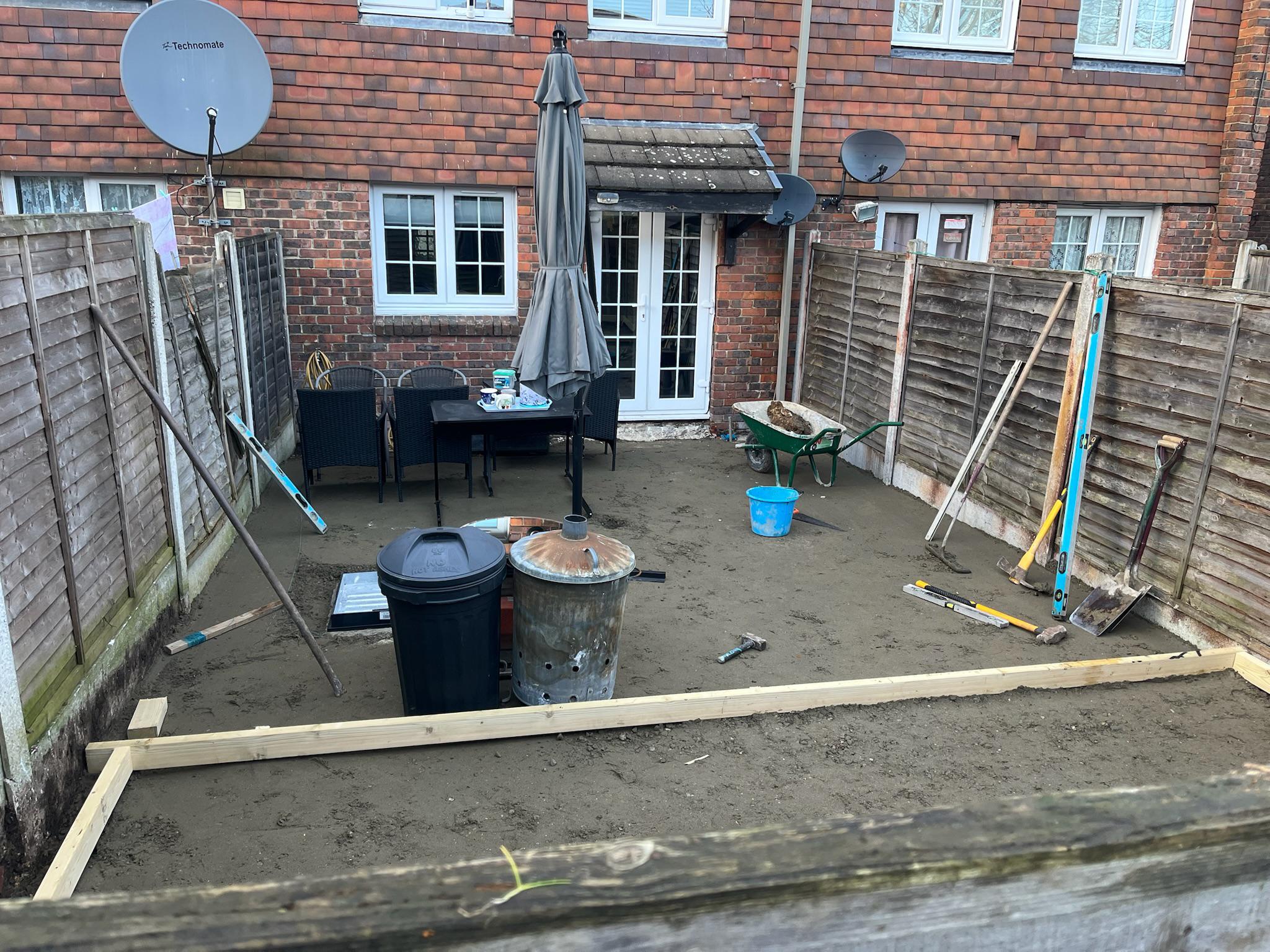 Budget-Friendly Dark Grey Slab Patio