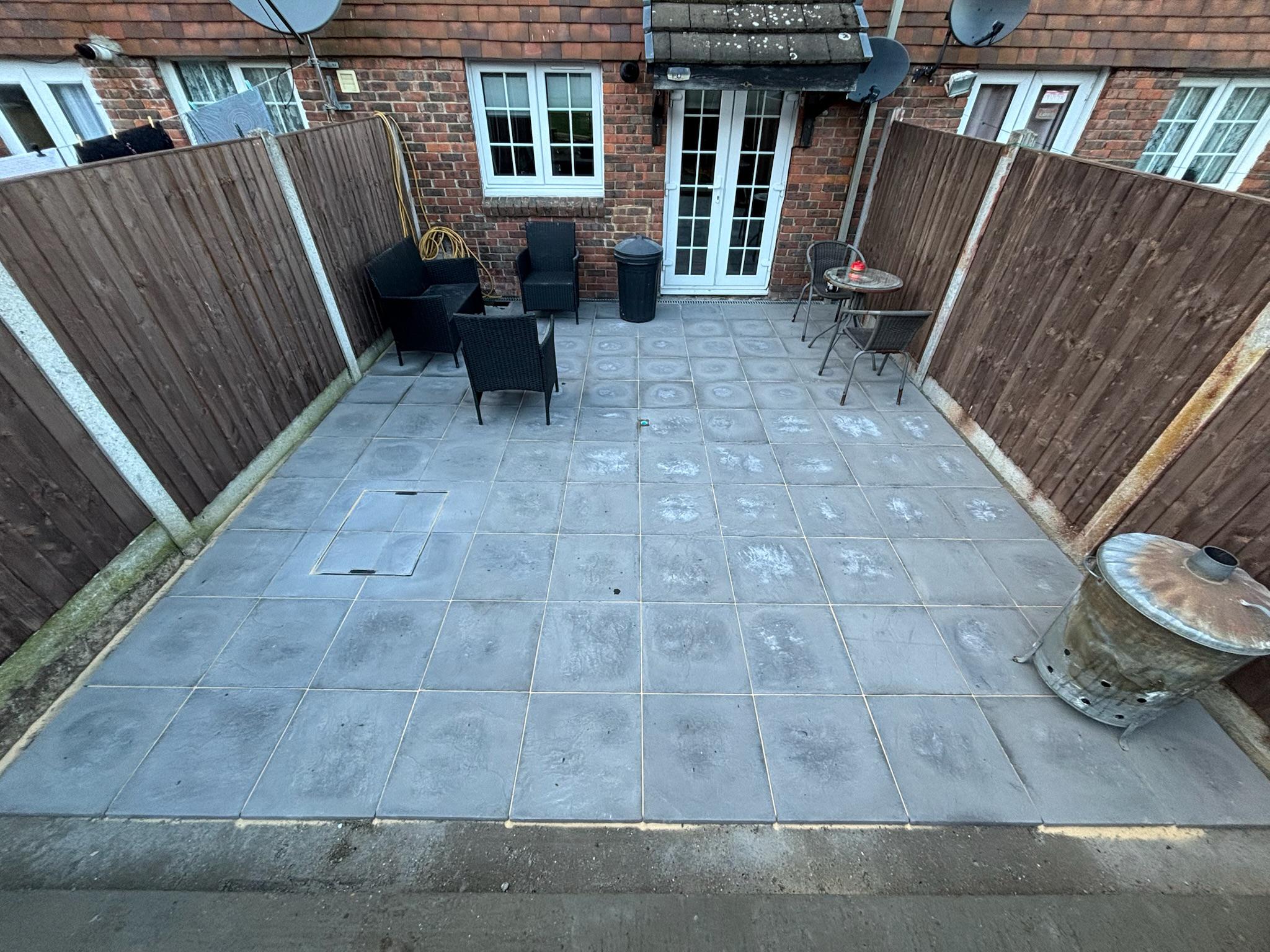 Budget-Friendly Dark Grey Slab Patio