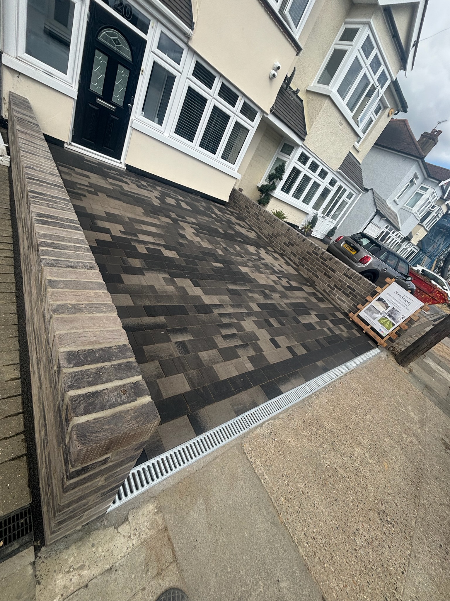 Castlepave Smooth Driveway with Ashingdon Grey Wall