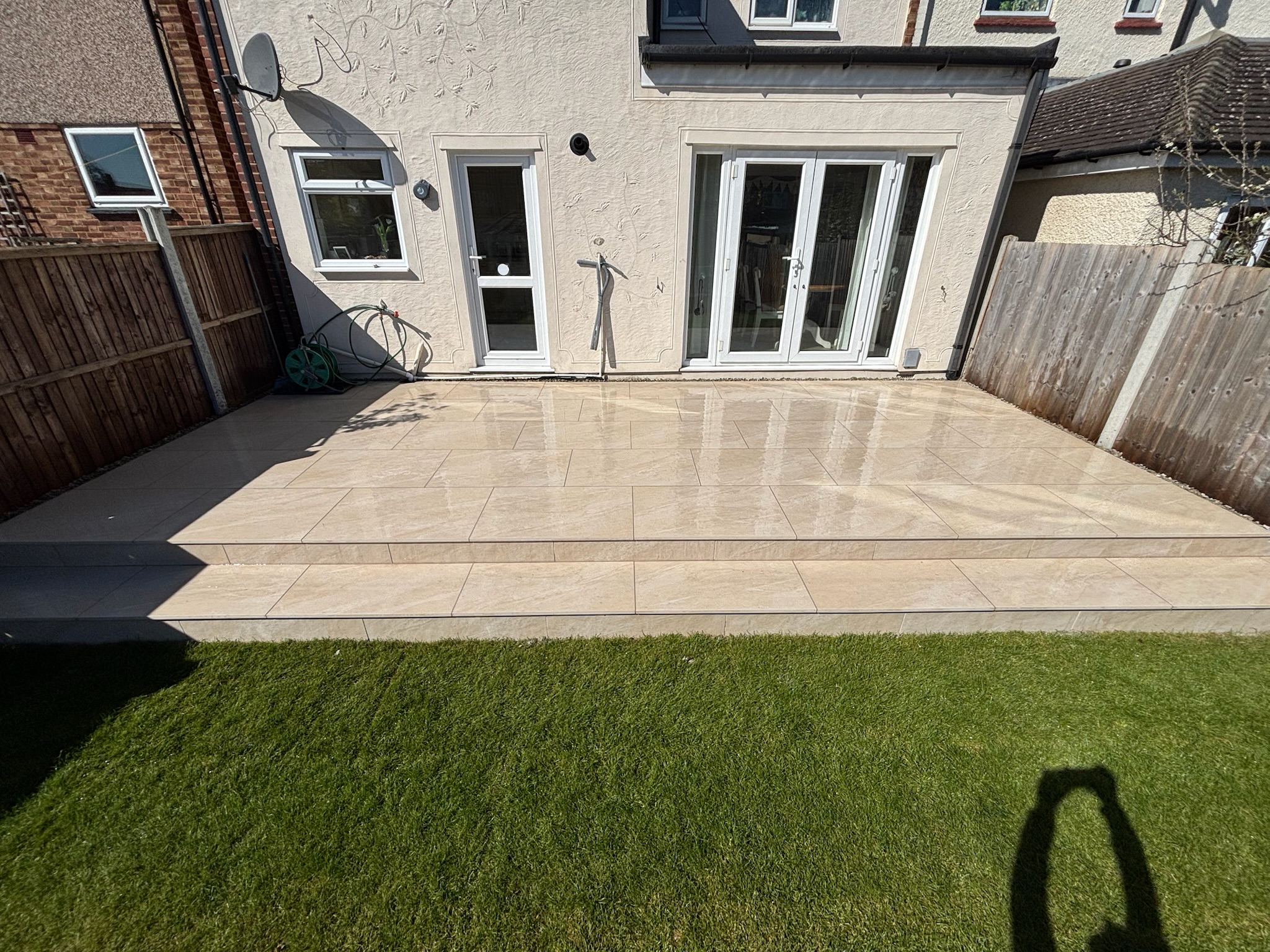 Lava Beige Porcelain Patio with Turf and Play Area finished photo 7
