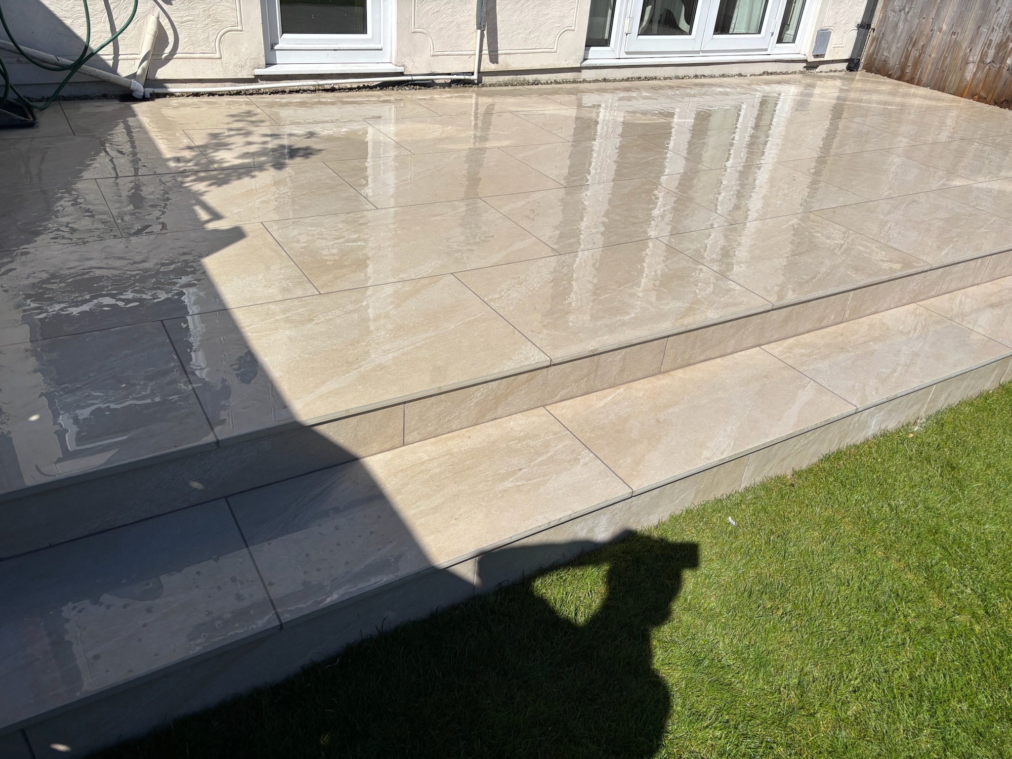 Lava Beige Porcelain Patio with Turf and Play Area finished photo 9