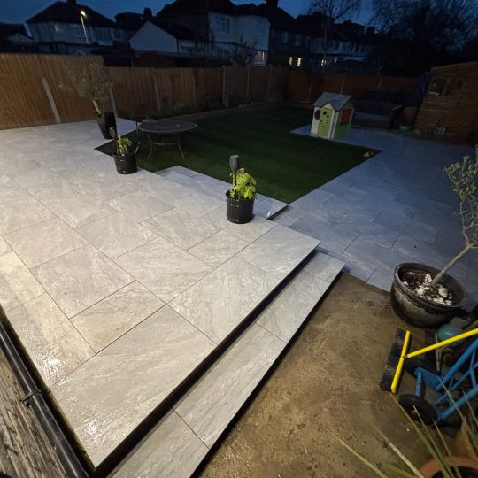 Multi-Level Porcelain Patio with Turf and Play Area